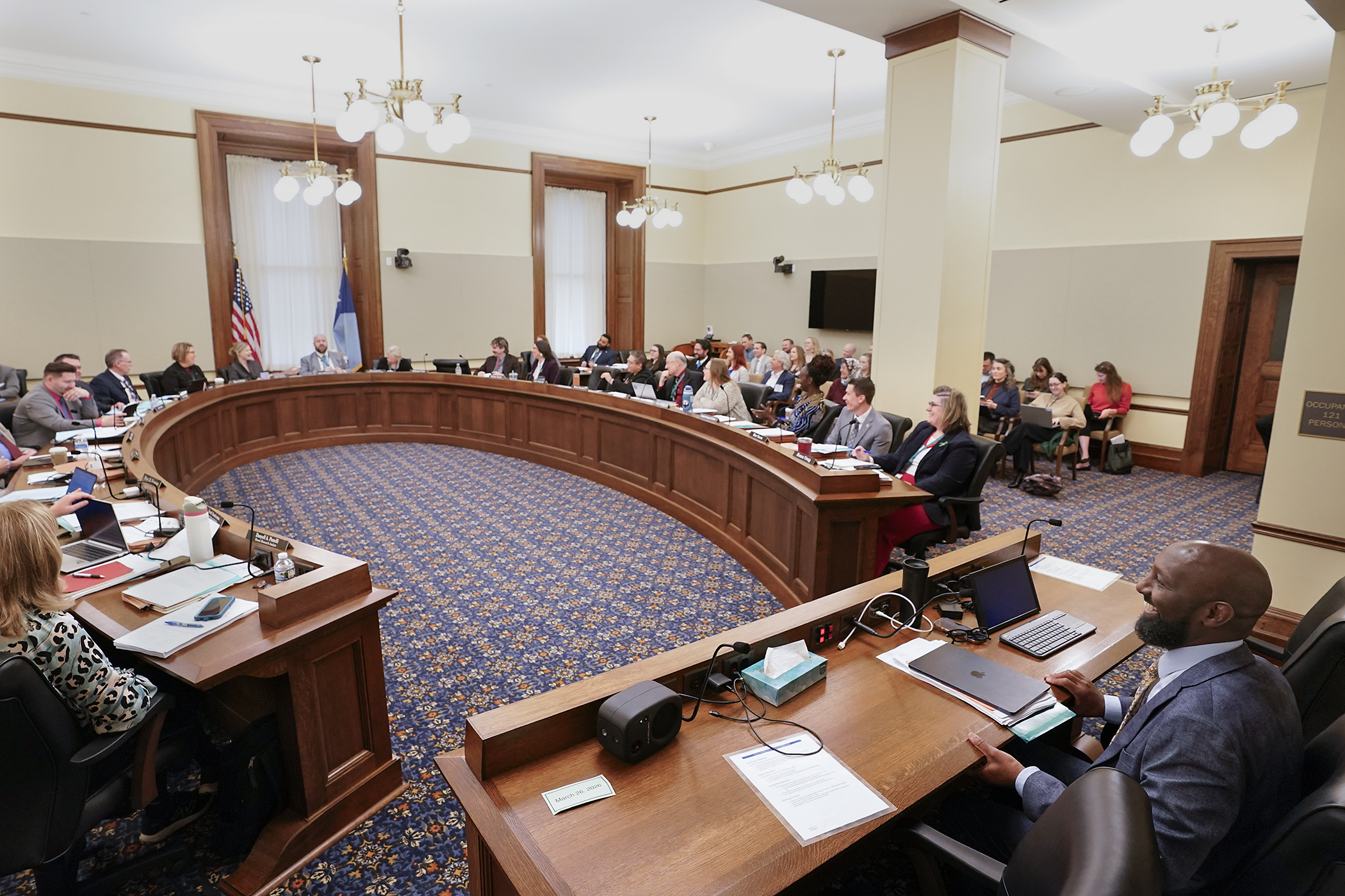 Rep. Mohamud Noor, co-chair of the House Human Services Finance and Policy Committee, smiles March 26 as the group finishes up work on HF729, the human services policy bill. (Photo by Michele Jokinen)